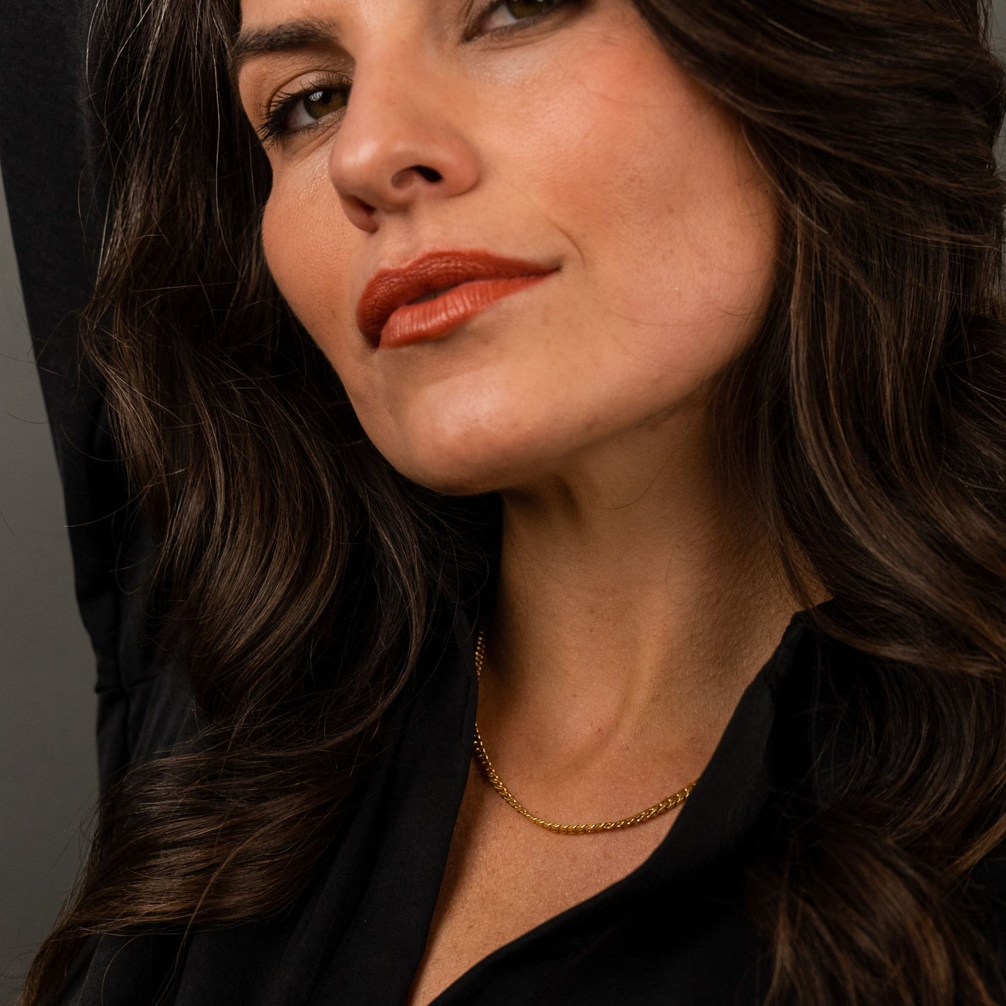 female model wearing the mars fish bone necklace in 18k gold vermeil chain detail view