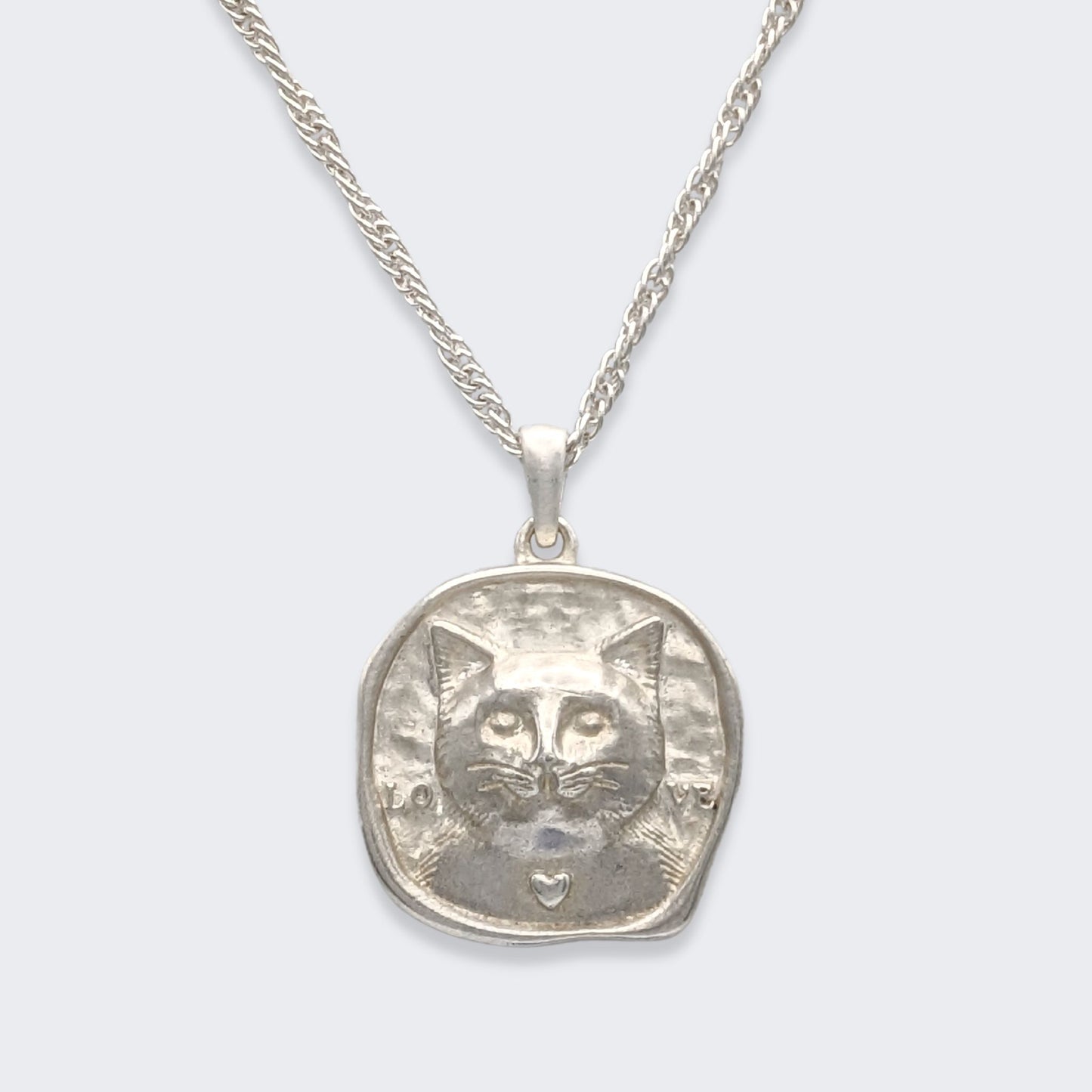 lars reversible cat coin necklace in sterling silver (front view)