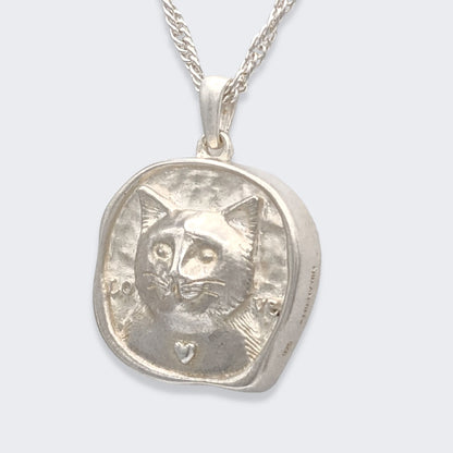 lars reversible cat coin necklace in sterling silver (left side view)