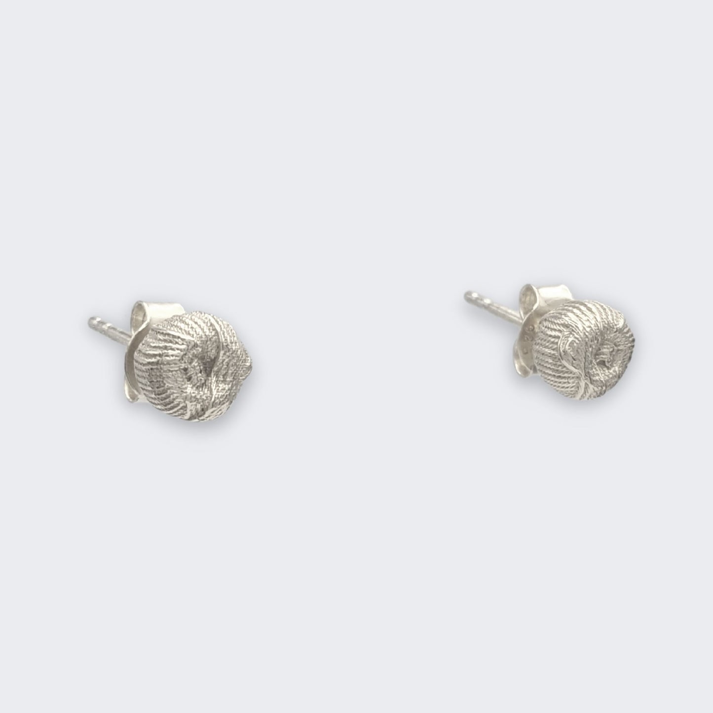 ren yarn stud earring in sterling silver pair (right side view)